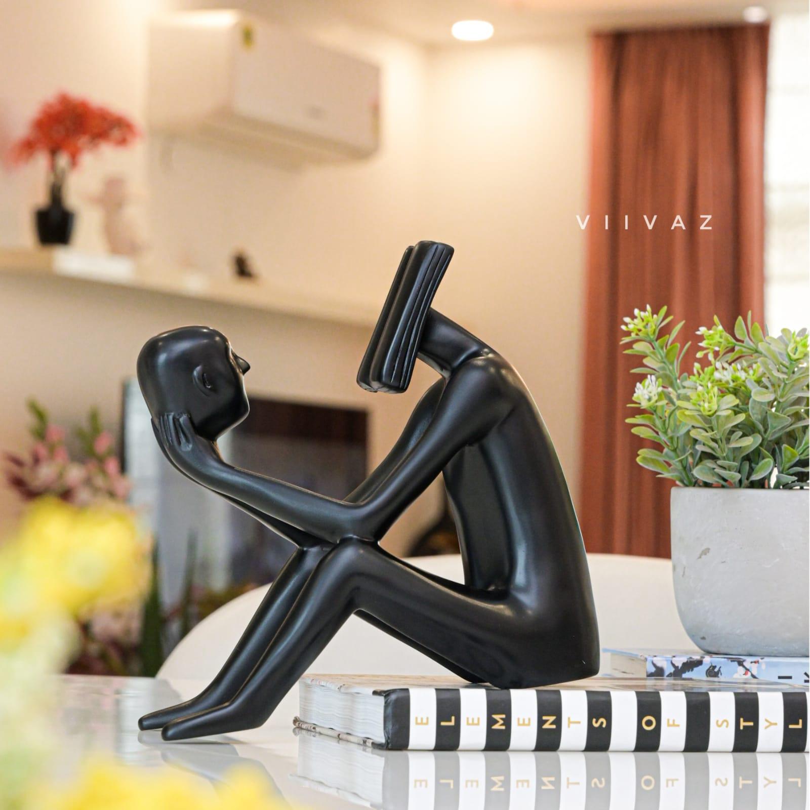 Abstract Man Reading a book sculpture